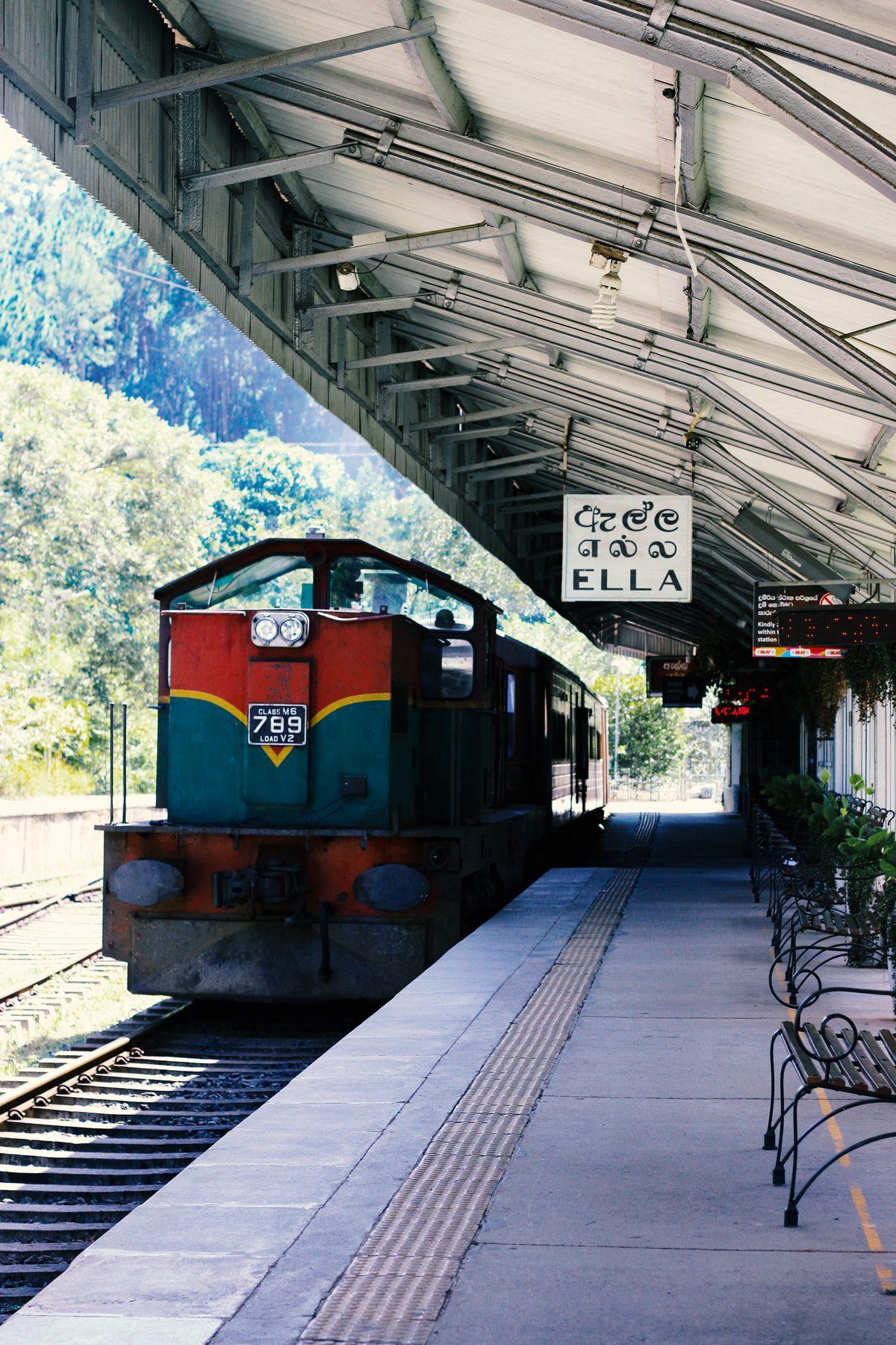 A train waiting at the platform at Ella station